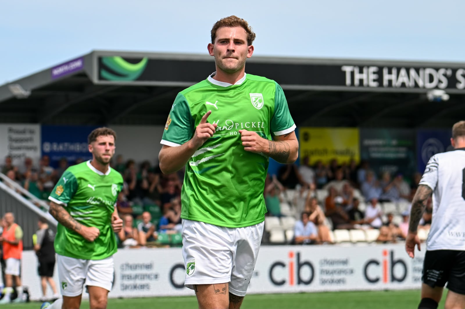 Greens edge whites in battle of Lions to win curtain raiser